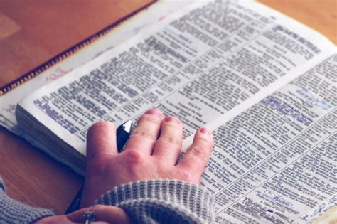 A person reading a Bible